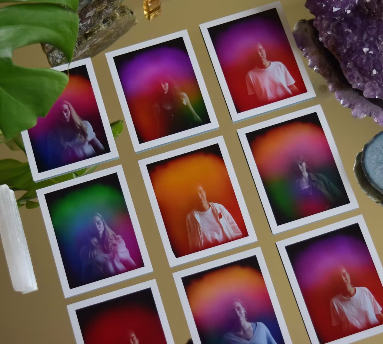 Aura still-life with polaroid portraits and crystals